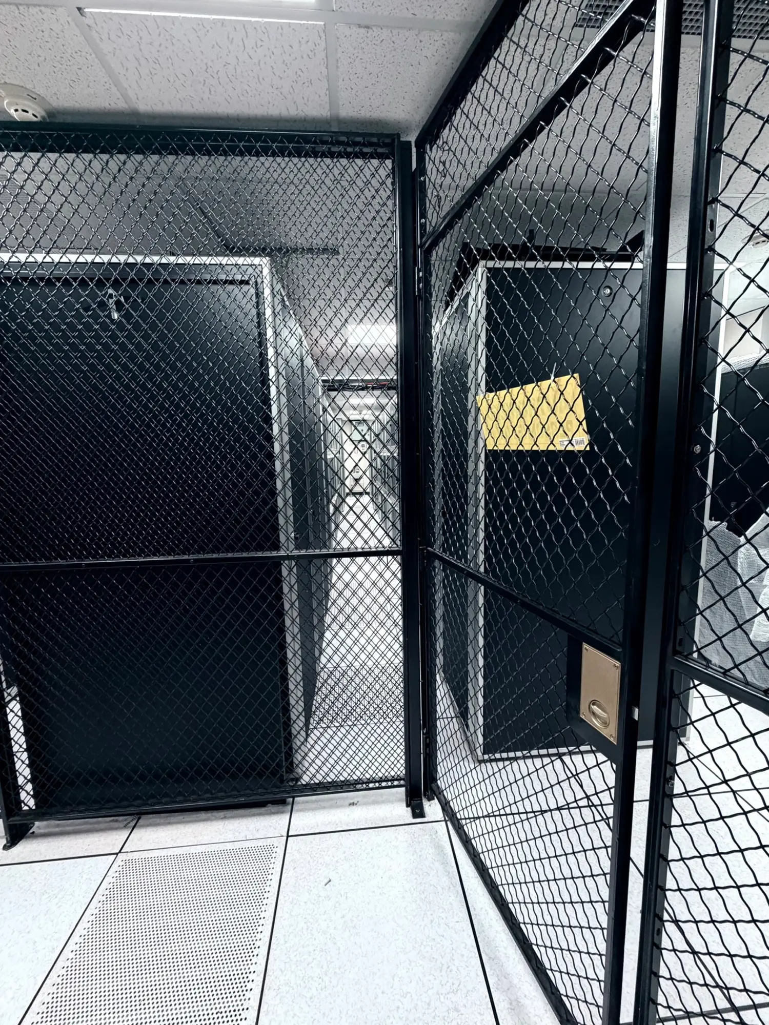 Private caged suite within the data center floor